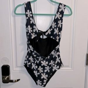 Of One Sea Cut-out One Piece in Black Plumeria Bathing suit
